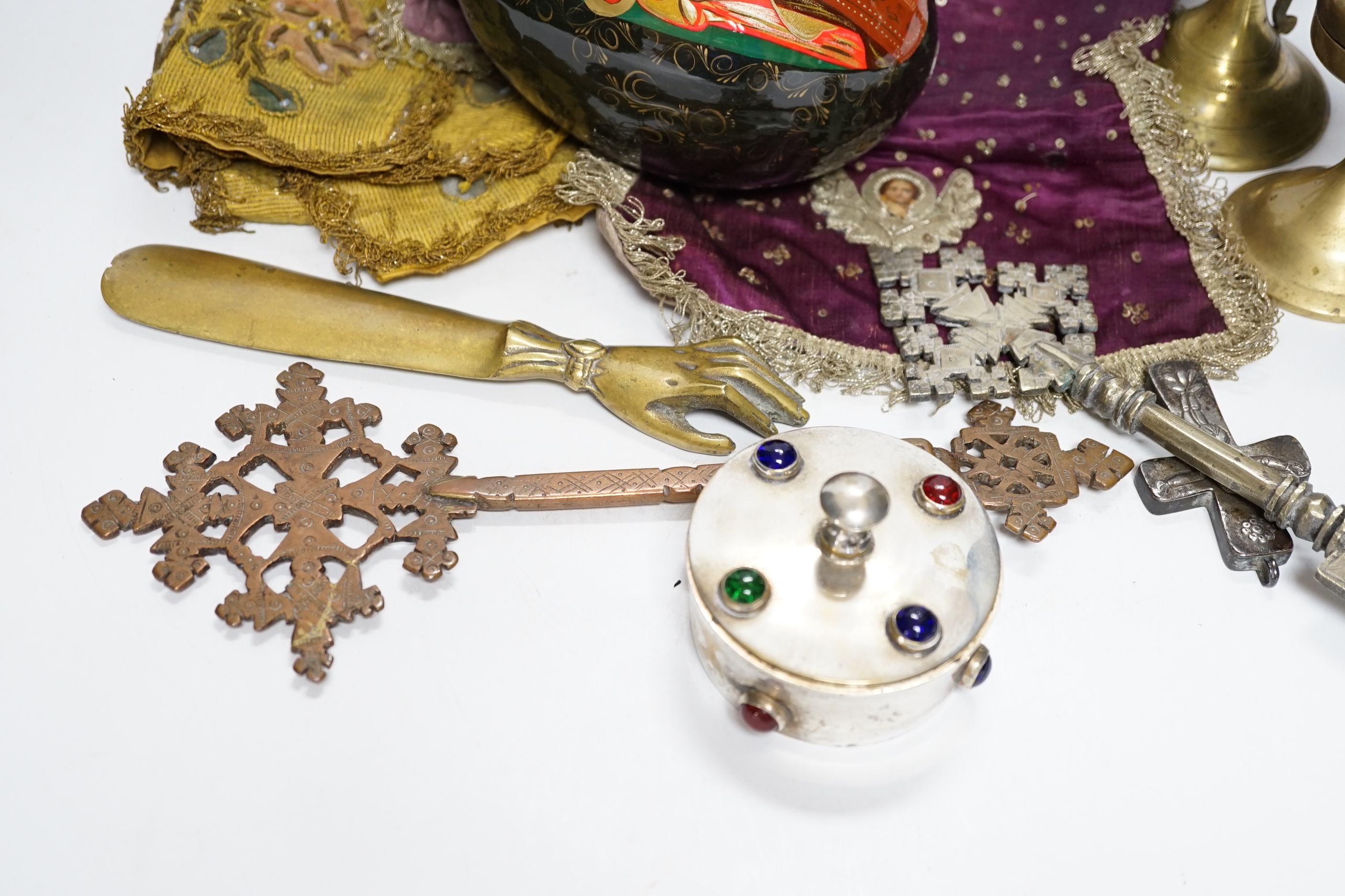 Coptic Christian items including crosses, censers, a brass angel, two embroidered chalice covers, a large painted egg with orthodox cross on the top, a lidded patten box, etc. (11)